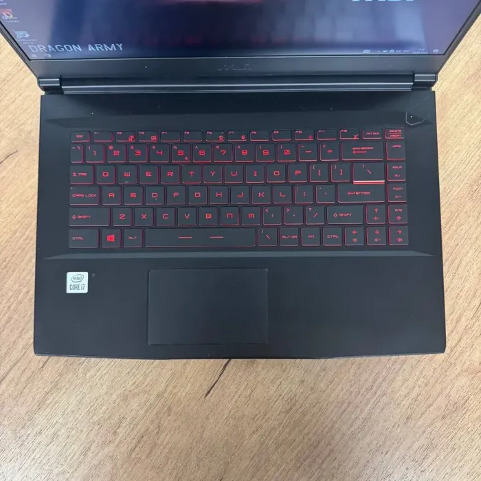 Ігровий ноутбук Б-клас MSI GF65 Thin 10UE / 15.6" (1920x1080) IPS / Intel Core i7-10750H (6 (12) ядер по 2.6 - 5.0 GHz) / 16 GB DDR4 / 512 GB SSD / nVidia GeForce RTX 3060, 6 GB GDDR6, 192-bit / WebCam б/в - зображення 7