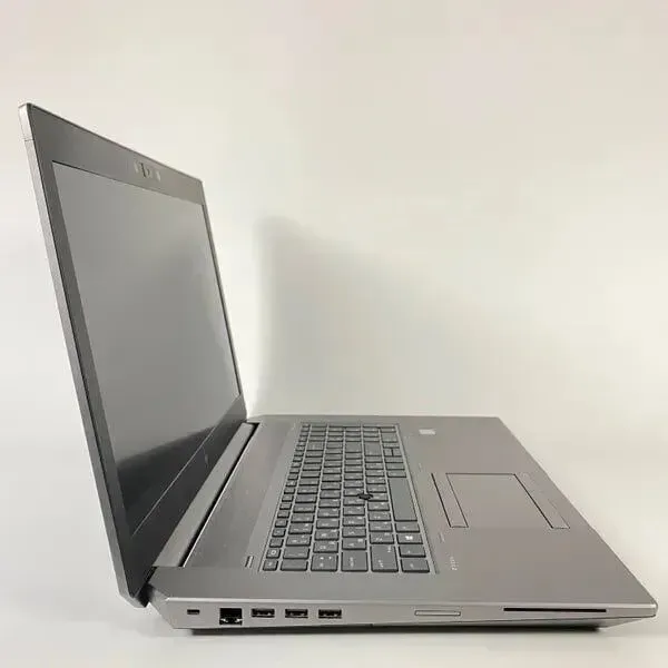 Мобільна робоча станція HP zBook 17 G6 / 17.3" (1920x1080) IPS / Intel Core i7-9850H (6 (12) ядер по 2.6 - 4.6 GHz) / 16 GB DDR4 / 512 GB SSD / nVidia Quadro RTX 3000, 6 GB GDDR6, 192-bit / WebCam / TouchID б/в - зображення 4