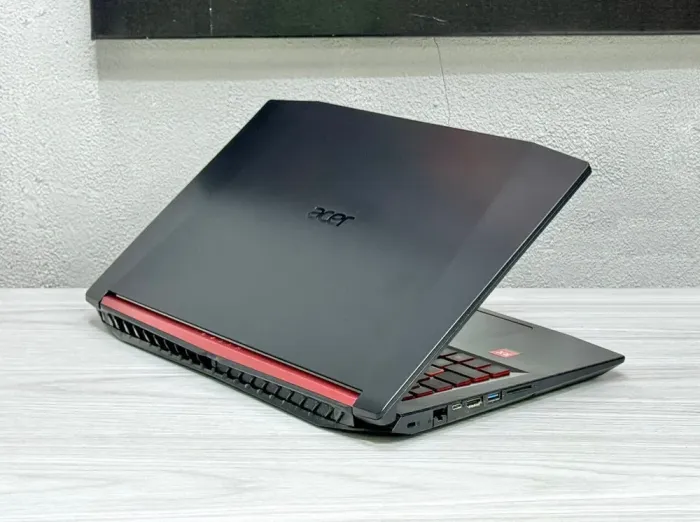 Ігровий ноутбук Acer Nitro 5 AN515-42 / 15.6" (1920x1080) IPS / AMD Ryzen 5 2500U (4 (8) ядра по 2.0 - 3.6 GHz) / 32 GB DDR4 / 128 GB SSD M.2 + 1000 GB HDD / AMD Radeon RX 560X, 4 GB GDDR5, 128-bit / WebCam / Win 10 Home б/в - зображення 4