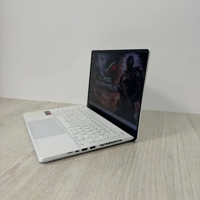 Ігровий ноутбук Б-класу Asus ROG Zephyrus G14 GA402RJ / 14" (2560x1600) IPS / AMD Ryzen 9 6900HS (8 (16) ядер по 3,3 - 4,9 ГГц) / 16 ГБ DDR5 / 1000 ГБ SSD NVMe / AMD Radeon RX 6700S, 8 ГБ GDDR6, 128-біт / Веб-камера б/в - зображення 6
