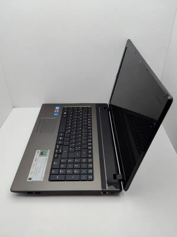 Ноутбук Acer Aspire 7750G / 17.3" (1600x900) TN / Intel Core i7-2630QM (4 (8) ядра по 2.0 - 2.9 GHz) / 6 GB DDR3 / 120 GB SSD + 750 GB HDD / AMD Radeon HD 6770M, 2 GB GDDR5, 128-bit / WebCam / DVD-ROM б/в - зображення 7