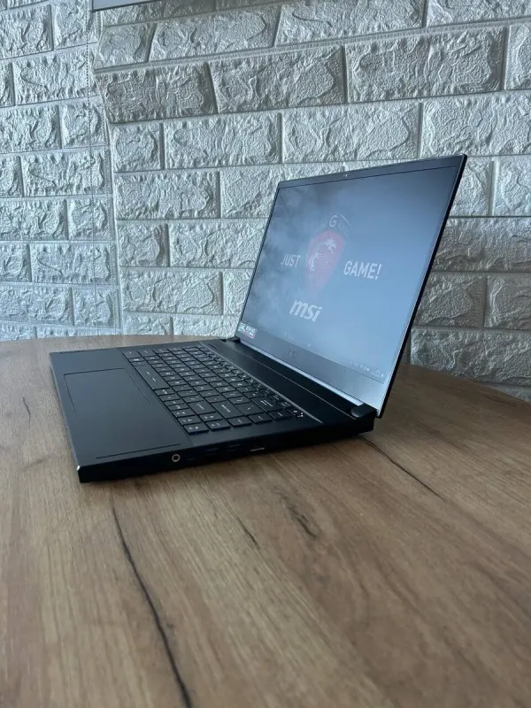 Ігровий ноутбук Б-клас MSI GS66 Stealth 11UE / 15.6" (1920x1080) IPS / Intel Core i7-11800H (8 (16) ядер по 2.3 - 4.6 GHz) / 16 GB DDR4 / 1000 GB SSD / nVidia GeForce RTX 3060, 6 GB GDDR6, 192-bit / WebCam б/в - зображення 5