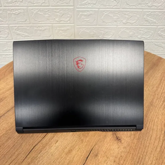 Ігровий ноутбук Б-клас MSI GF63 Thin 11SC / 15.6" (1920x1080) IPS / Intel Core i5-11400H (6 (12) ядер по 2.7 - 4.5 GHz) / 8 GB DDR4 / 256 GB SSD / nVidia GeForce GTX 1650 Max-Q, 4 GB GDDR6, 128-bit / WebCam б/в - зображення 3