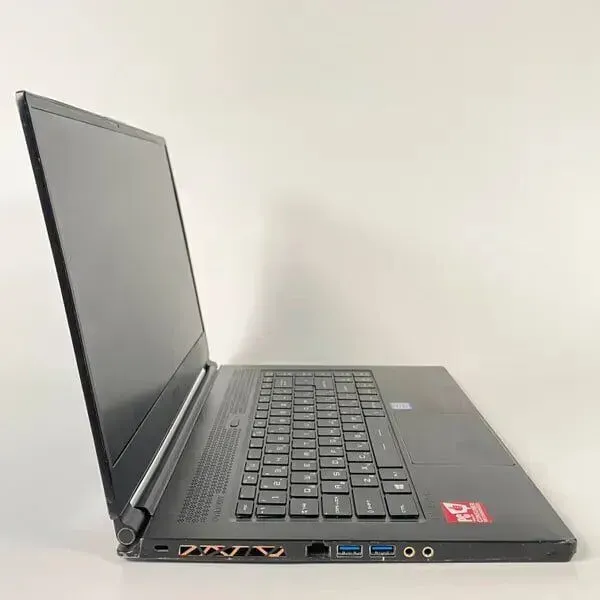 Ігровий ноутбук Б-клас MSI GS65 Stealth Thin 8RF / 15.6" (1920x1080) IPS / Intel Core i7-8750H (6 (12) ядер по 2.2 - 4.1 GHz) / 16 GB DDR4 / 512 GB SSD / nVidia GeForce GTX 1070 Max-Q, 8 GB GDDR5, 256-bit / WebCam б/в - зображення 4