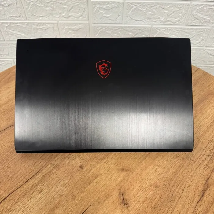 Ігровий ноутбук Б-клас MSI GF75 Thin 10UEK / 15.6" (1920x1080) IPS / Intel Core i7-10750H (6 (12) ядер по 2.6 - 5.0 GHz) / 16 GB DDR4 / 500 GB SSD / nVidia GeForce RTX 3060, 6 GB GDDR6, 192-bit / WebCam б/в - зображення 3