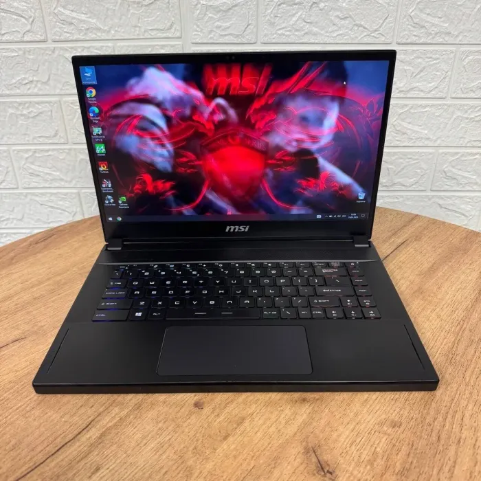 Ігровий ноутбук MSI GS66 Stealth 10SF / 15.6" (1920x1080) IPS / Intel Core i7-10750H (6 (12) ядер по 2.6 - 5.0 GHz) / 16 GB DDR4 / 512 GB SSD / nVidia GeForce RTX 2070, 8 GB GDDR6, 256-bit / WebCam б/в - зображення 2