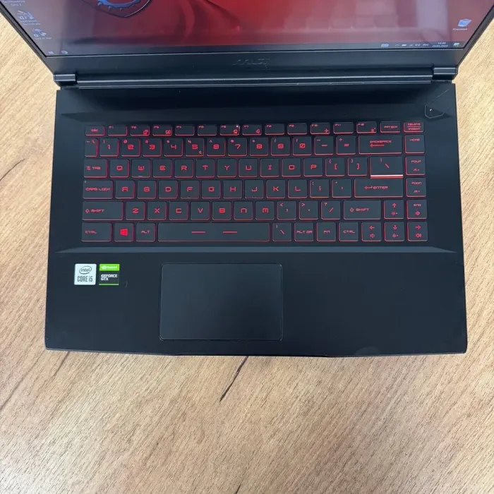 Ігровий ноутбук MSI GF63 Thin 10SC / 15.6" (1920x1080) IPS / Intel Core i5-10500H (6 (12) ядер по 2.5 - 4.5 GHz) / 16 GB DDR4 / 128 GB SSD NVMe + 1000 GB HDD / nVidia GeForce GTX 1650 Max-Q, 4 GB GDDR6, 128-bit / WebCam б/в - зображення 7