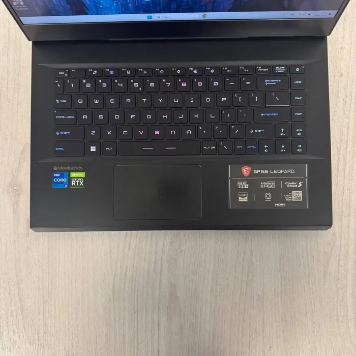 Ігровий ноутбук Б-класу MSI GP66 Leopard 11UH / 15.6" (1920x1080) IPS / Intel Core i7-11800H (8 (16) ядер по 1.9 - 4.6 GHz) / 16 GB DDR4 / 256 GB SSD / nVidia GeForce RTX 3080, 8 GB GDDR6, 256-bit / WebCam б/в - зображення 3