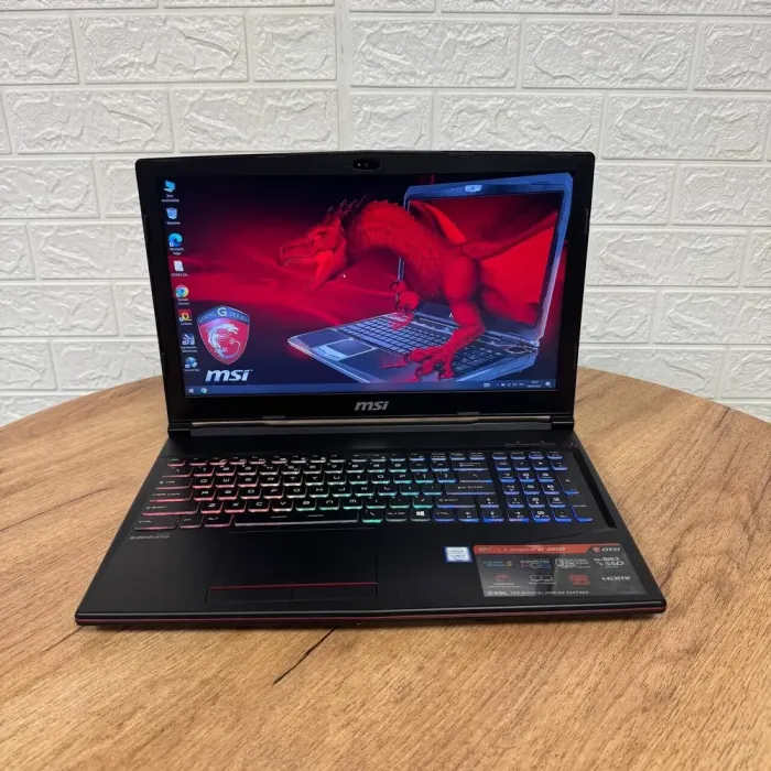 Ігровий ноутбук MSI GP63 Leopard 8RD / 15.6" (1920x1080) TN / Intel Core i7-8750H (6 (12) ядер по 2.2 - 4.1 GHz) / 8 GB DDR4 / 256 GB SSD / nVidia GeForce GTX 1050 Ti, 4 GB GDDR5, 128-bit / WebCam б/в - зображення 2