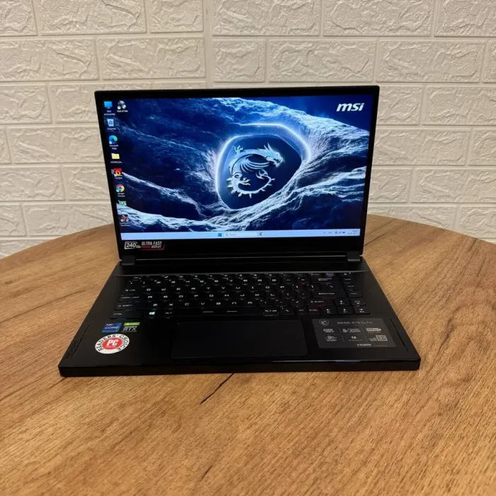 Ігровий ноутбук MSI GS66 Stealth 11UE / 15.6" (1920x1080) IPS / Intel Core i7-11800H (8 (16) ядер по 2.3 - 4.6 GHz) / 16 GB DDR4 / 1000 GB SSD / nVidia GeForce RTX 3060, 6 GB GDDR6, 192-bit / WebCam б/в - зображення 2