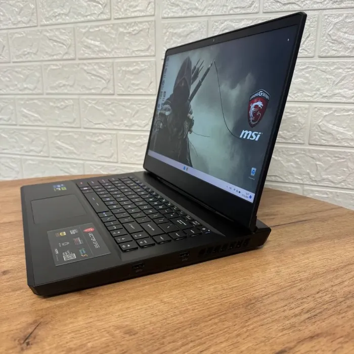 Ігровий ноутбук Б-клас MSI Vector GP66 12UHSO / 15.6" (1920x1080) IPS / Intel Core i7-12650H (10 (16) ядер по 3.5 - 4.7 GHz) / 16 GB DDR5 / 1000 GB SSD NVMe / nVidia GeForce RTX 3080 Ti, 16 GB GDDR6, 256-bit / WebCam б/в - зображення 5