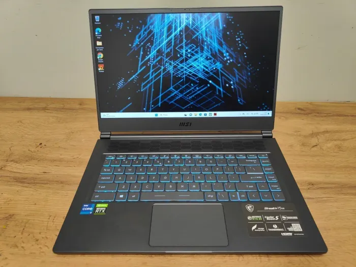 Ігровий ноутбук MSI Stealth 15M A11UEKV / 15.6" (1920x1080) IPS / Intel Core i7-11375H (4 (8) ядра по 3.0 - 5.0 GHz) / 16 GB DDR4 / 512 GB SSD / nVidia GeForce RTX 3060, 6 GB GDDR6, 192-bit / WebCam / Windows 10 Home б/в - зображення 2