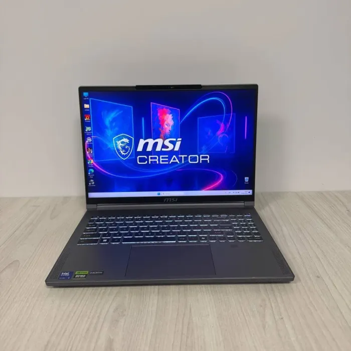 Ігровий ноутбук Б-класу MSI Creator 16 AI Studio A1VHG / 16" (3840x2400) IPS / Intel Core Ultra 9 185H (16 (22) ядер по 3,9 - 5,1 ГГц) / 32 ГБ DDR5 / 1000 ГБ SSD NVMe / nVidia GeForce RTX 4080, 12 ГБ GDDR6, 192-bit / WebCam б/в - зображення 2