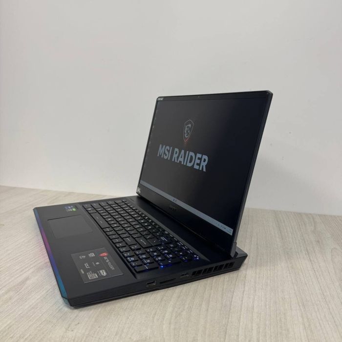 Ігровий ноутбук Б-класу MSI GE76 Raider 11UH / 17,3" (1920x1080) IPS / Intel Core i9-11980HK (8 (16 ядер по 3,3 - 5,0 ГГц) / 32 ГБ DDR4 / 512 ГБ SSD / nVidia GeForce RTX 3080, 16 ГБ GDDR6, 256-біт / WebCam б/в - зображення 6