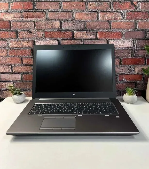 Мобільна робоча станція HP zBook 17 G6 / 17.3" (1920x1080) IPS / Intel Core i7-9850H (6 (12) ядер по 2.6 - 4.6 GHz) / 32 GB DDR4 / 512 GB SSD M.2 / nVidia Quadro RTX 3000, 6 GB GDDR6, 192-bit / WebCam / Win 11 Pro б/в - зображення 9