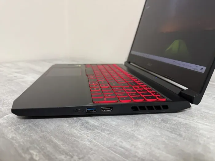 Ігровий ноутбук Б-класу Acer Nitro 5 AN515-55-53E5 / 15.6" (1920x1080) IPS / Intel Core i5-10300H (4 (8) ядра по 2,5 - 4,5 ГГц) / 16 ГБ DDR4 / 512 ГБ SSD / nVidia GeForce RTX 3050, 4 ГБ GDDR6, 128-bit / WebCam / Win 10 Home б/в - зображення 7