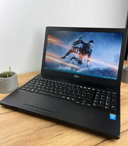 Ноутбук Fujitsu LifeBook A555 / 15.6" TN / Core i3-5005U (2(4) ядра по 2 GHz) / 8GB DDR3 / 500GB HDD / HD Graphics 5500 / WebCam / Win 10 PRO Lic б/в - зображення 2