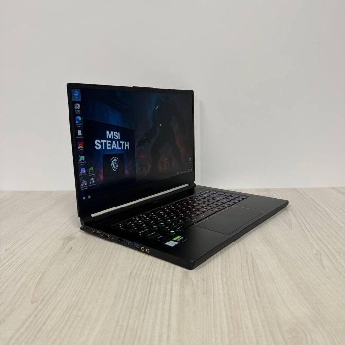Ігровий ноутбук Б-клас MSI GS65 Stealth 9SE / 15.6" (1920x1080) IPS / Intel Core i7-9750H (6 (12) ядер по 2.6 - 4.5 GHz) / 16 GB DDR4 / 512 GB SSD NVMe / nVidia GeForce RTX 2060, 6 GB GDDR6, 192-bit / WebCam б/в - зображення 4