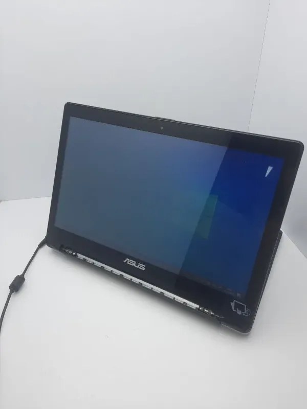 Ноутбук Б-клас Asus TP550L / 15.6" (1366x768) TN / Intel Core i5-4210U (2 (4) ядра по 1.7 - 2.7 GHz) / 4 GB DDR3 / 320 GB HDD / Intel HD Graphics 4400 / WebCam / АКБ не тримає б/в - зображення 4