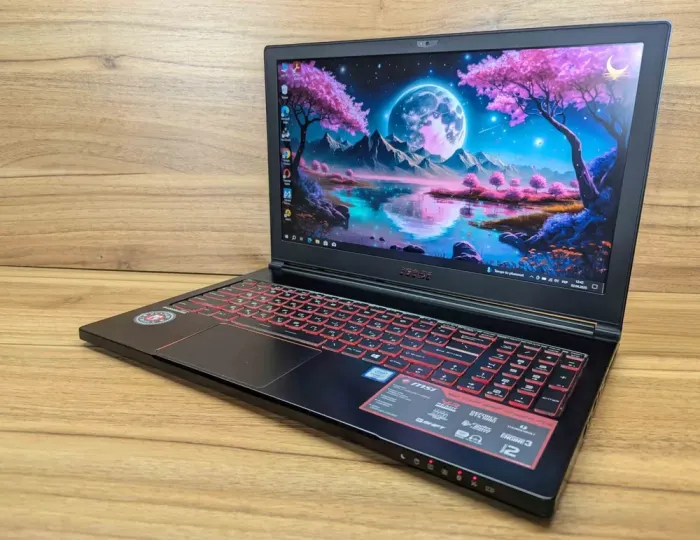 Ігровий ноутбук MSI GS63 / 15.6" (1920x1080) IPS / Intel Core i7-6700HQ (4 (8) ядра по 2.6 - 3.5 GHz) / 16 GB DDR4 / 256 GB SSD + 1000 GB HDD / nVidia GeForce GTX 1060, 6 GB GDDR5, 192-bit / WebCam / Windows 10 б/в - зображення 5