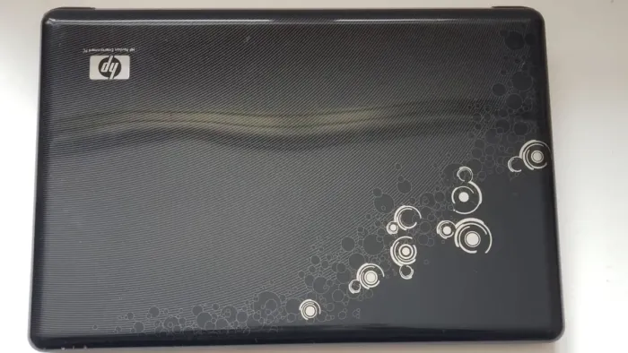 Ноутбук Б-клас HP Pavilion dv6-1120er / 15.6" (1366x768) TN / AMD Turion X2 RM-75 (2 ядра по 2.2 GHz) / 4 GB DDR2 / 180 GB SSD / AMD Radeon HD 4530, 512 MB GDDR3, 64-bit / WebCam / DVD-ROM / АКБ не держит б/в - зображення 8