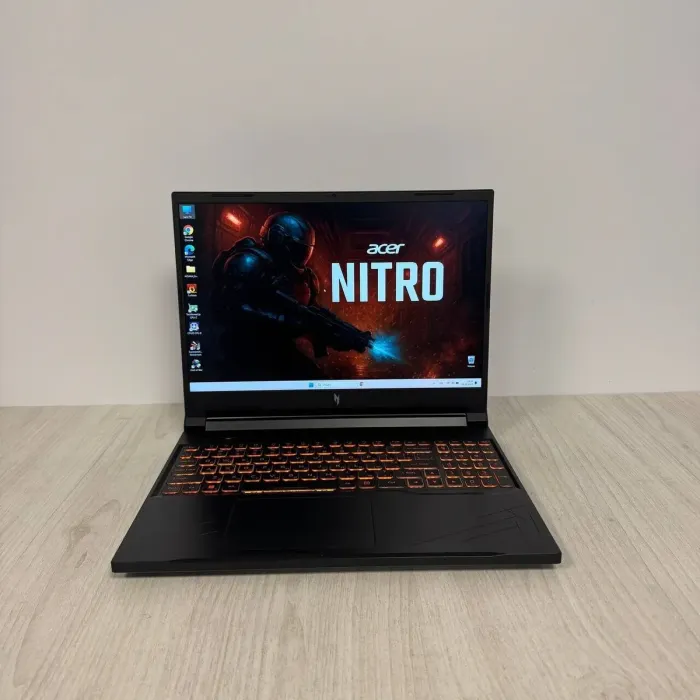 Ігровий ноутбук Б-класу Acer Nitro V16 ANV16-41 / 16" (1920x1200) IPS / AMD Ryzen 5 8645HS (6 (12) ядер по 4,3 - 5,0 ГГц) / 16 ГБ DDR5 / 512 ГБ SSD / nVidia GeForce RTX 4060, 8 ГБ GDDR6, 128-біт / WebCam б/в - зображення 2