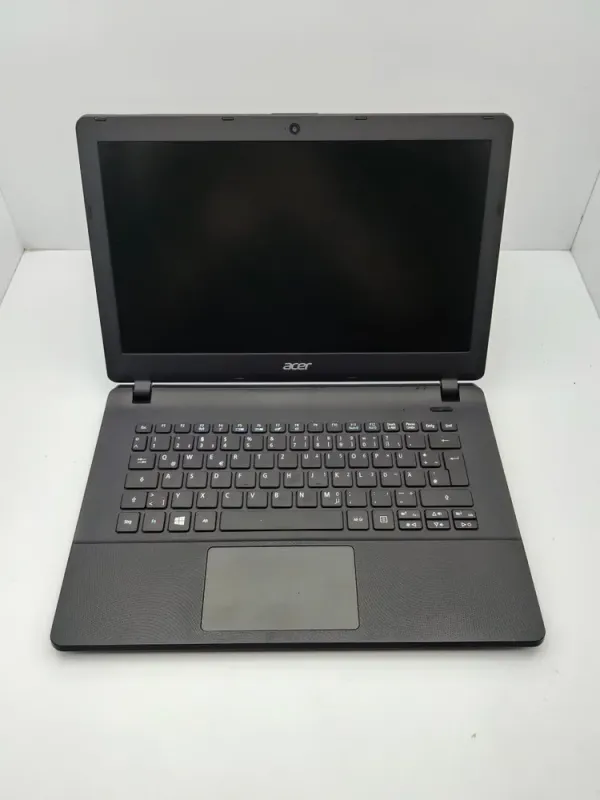 Ноутбук Acer E1-311 / 14" (1366x768) TN / Intel Celeron N2940 (4 ядра по 1.83 - 2.25 GHz) / 4 GB DDR3 / 500 GB HDD / Intel HD Graphics / WebCam б/в - зображення 2