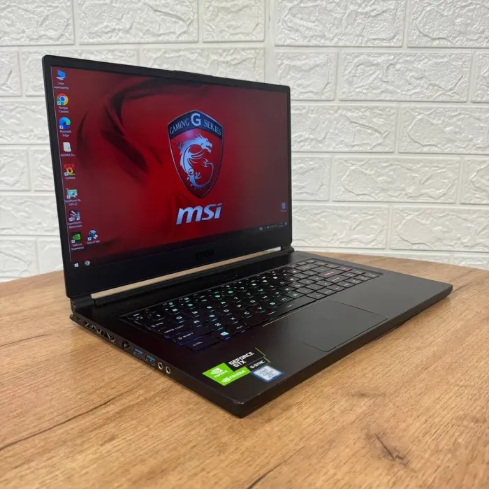 Ігровий ноутбук Б-клас MSI GS65 8RF Stealth Thin / 15.6" (1920x1080) IPS / Intel Core i7-8750H (6 (12) ядер по 2.2 - 4.1 GHz) / 32 GB DDR4 / 512 GB SSD / nVidia GeForce GTX 1070 Max-Q, 8 GB GDDR5, 256-bit / WebCam б/в - зображення 4