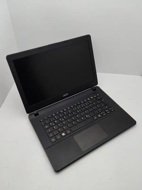 Ноутбук Acer E1-311 / 14" (1366x768) TN / Intel Celeron N2940 (4 ядра по 1.83 - 2.25 GHz) / 4 GB DDR3 / 500 GB HDD / Intel HD Graphics / WebCam б/в - зображення 3