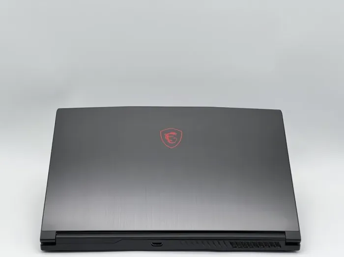 Ігровий ноутбук MSI GF63 8RD / 15.6" (1920x1080) IPS / Intel Core i7-8750H (6 (12) ядер по 2.2 - 4.1 GHz) / 16 GB DDR4 / 480 GB SSD / nVidia GeForce GTX 1050 Ti, 4 GB GDDR5, 128-bit / WebCam б/в - зображення 5
