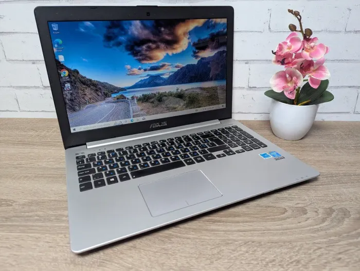 Ноутбук Б-клас Asus R553L / 15.6" (1366x768) TN / Intel Core i3-4030U (2 (4) ядра по 1.9 GHz) / 8 GB DDR3 / 128 GB SSD / Intel HD Graphics 4400 / WebCam / DVD-ROM б/в - зображення 2