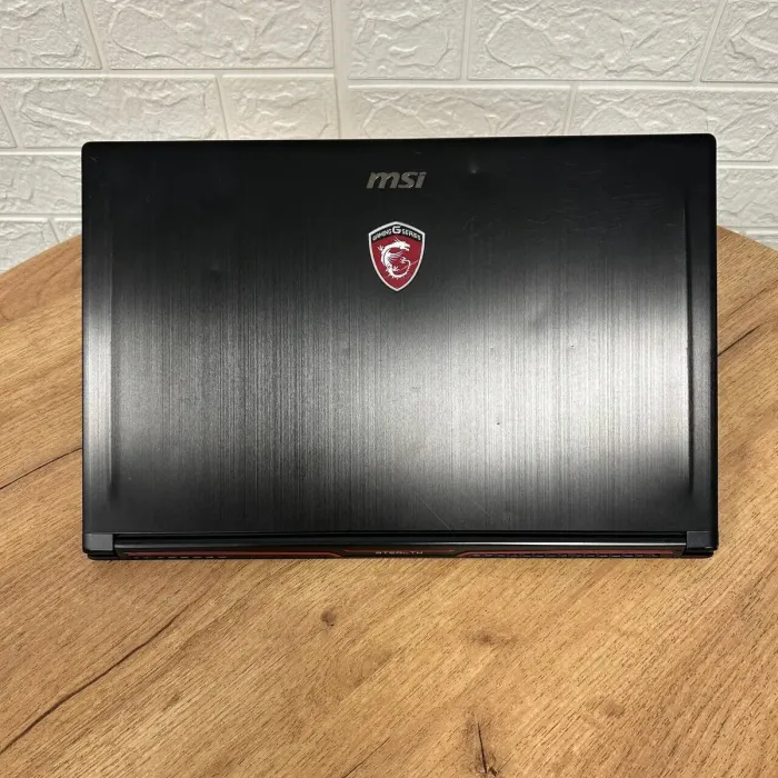 Ігровий ноутбук Б-клас MSI GS63VR Stealth 6RF / 15.6" (1920x1080) IPS / Intel Core i7-6700HQ (4 (8) ядра по 2.6 - 3.5 GHz) / 16 GB DDR4 / 128 GB SSD M.2 + 1000 GB HDD / nVidia GeForce GTX 1060, 6 GB GDDR5, 192-bit / WebCam б/в - зображення 3