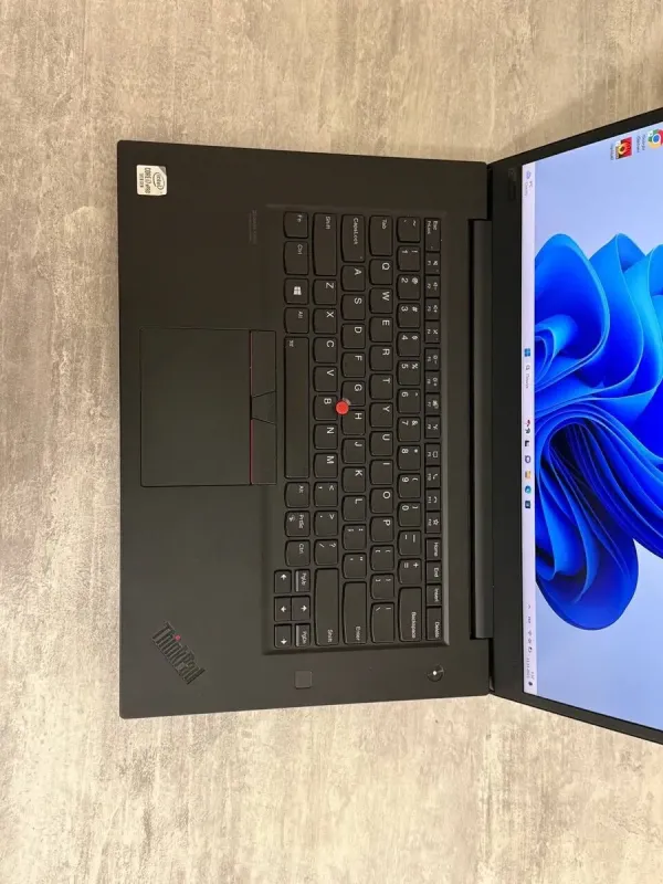Ігровий ультрабук Б-класу Lenovo ThinkPad X1 Extreme Gen 3 / 15,6" (1920x1080) IPS / Intel Core i7-10850H (6 (12) ядер по 2,7 - 5,1 ГГц) / 32 ГБ DDR4 / 512 ГБ SSD / nVidia GeForce GTX 1650 Max-Q, 4 ГБ GDDR6, 128-біт / WebCam / Win 11 Pro б/в - изображение 7