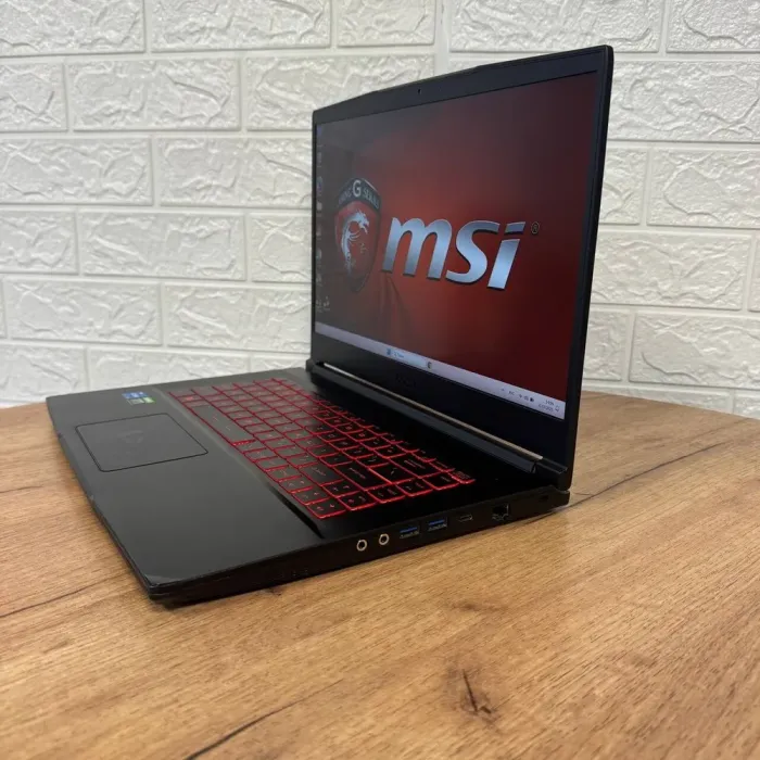 Ігровий ноутбук Б-клас MSI GF63 Thin 11UD / 15.6" (1920x1080) IPS / Intel Core i5-11400H (6 (12) ядер по 2.7 - 4.5 GHz) / 16 GB DDR4 / 512 GB SSD / nVidia GeForce RTX 3050 Ti, 4 GB GDDR6, 128-bit / WebCam б/в - зображення 5