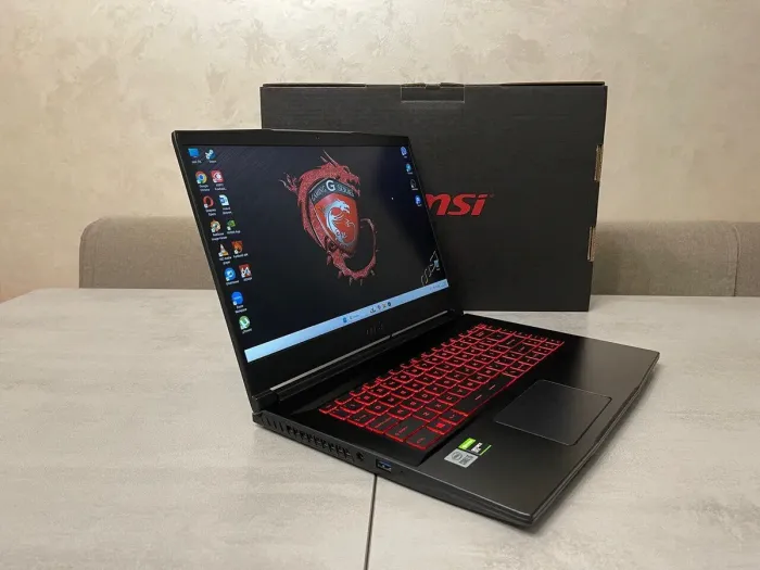 Ігровий ноутбук MSI Thin 15 GF63 10SC-035US / 15,6" (1920x1080) IPS / Intel Core i5-10300H (4 (8) ядра по 2,5 - 4,5 ГГц) / 16 ГБ DDR4 / 256 ГБ SSD M.2 + 500 ГБ HDD / nVidia GeForce GTX 1650 Max-Q, 4 ГБ GDDR5, 128-біт / WebCam б/в - зображення 5