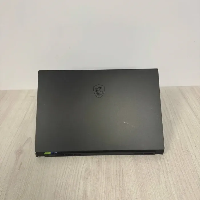 Ігровий ноутбук Б-класу MSI Stealth GS66 12UH / 15.6" (2560x1440) IPS / Intel Core i9-12900H (14 (20) ядер по 3,8 - 5,0 ГГц) / 16 ГБ DDR5 / 512 ГБ SSD / nVidia GeForce RTX 3080, 8 ГБ GDDR6, 256-bit / WebCam б/в - зображення 7