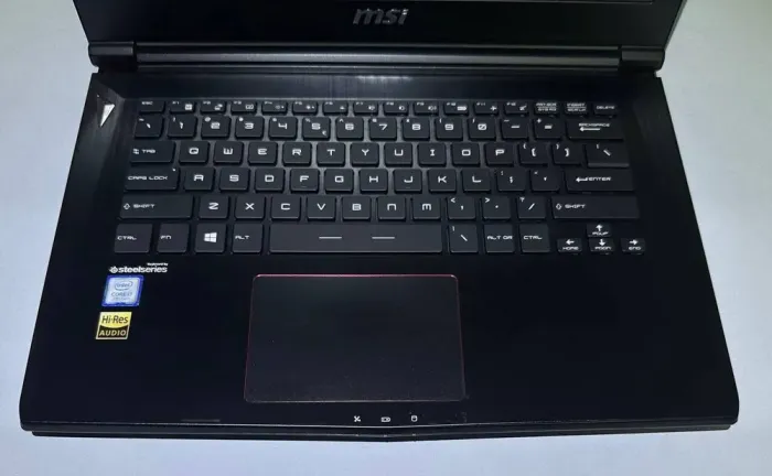 Ігровий ультрабук Б-клас MSI GS43VR 6RE Phantom Pro / 14.1" (1920x1080) TN / Intel Core i7-7700HQ (4 (8) ядра по 2.8 - 3.8 GHz) / 32 GB DDR4 / 256 GB SSD / nVidia GeForce GTX 1060, 6 GB GDDR5, 192-bit / WebCam / Win 11 б/в - зображення 5