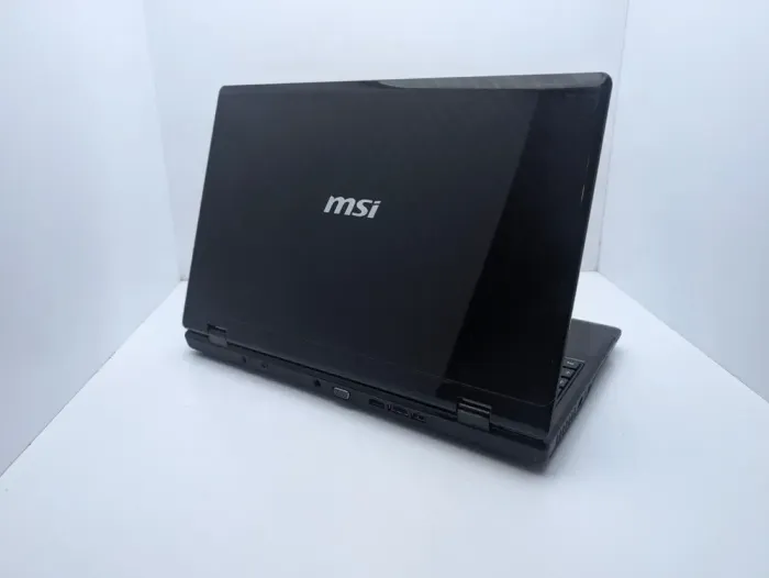 Ноутбук MSI CX63 / 15.6" (1366x768) TN / Intel Core i5-460M (2 (4) ядра по 2.53 - 2.8GHz) / 6 GB DDR3 / 500 GB HDD / nVidia GeForce 310M, 1 GB GDDR3, 64-bit / WebCam б/в - зображення 8