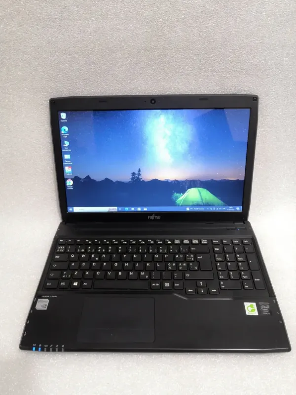 Ноутбук Б-клас Fujitsu LifeBook AH544 / 15.6'' TN / Core i5-4200M (2(4) ядра по 2.5-3.1 GHz) / 8GB DDR3 / 750GB HDD / GeForce GT 720M, 2GB DDR3, 64-bit / WebCam / DVD-ROM / VGA б/в - зображення 2