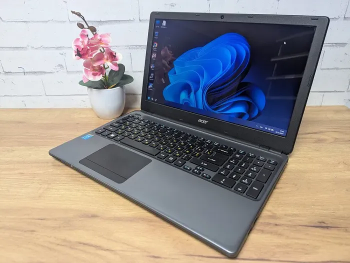 Ноутбук Б-клас Acer Aspire E1 V5WE2 / 15.6" (1366x768) TN / Intel Core i7-4500U (2 (4) ядра по 1.8 - 3.0 GHz) / 8 GB DDR3 / 128 GB SSD / Intel HD Graphics 4400 / WebCam б/в - зображення 5