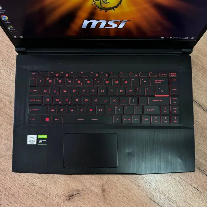Ігровий ноутбук Б-клас MSI GF65 Thin 10SDR / 15.6" (1920x1080) IPS / Intel Core i7-10750H (6 (12) ядер по 2.6 - 5.0 GHz) / 8 GB DDR4 / 512 GB SSD / nVidia GeForce GTX 1660 Ti, 6 GB GDDR6, 192-bit / WebCam б/в - зображення 7