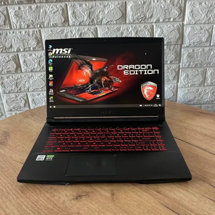 Ігровий ноутбук Б-клас MSI GF65 Thin 10UE / 15.6" (1920x1080) IPS / Intel Core i5-10500H (6 (12) ядер по 2.5 - 4.5 GHz) / 16 GB DDR4 / 512 GB SSD / nVidia GeForce RTX 3060, 6 GB GDDR6, 192-bit / WebCam б/в - зображення 2