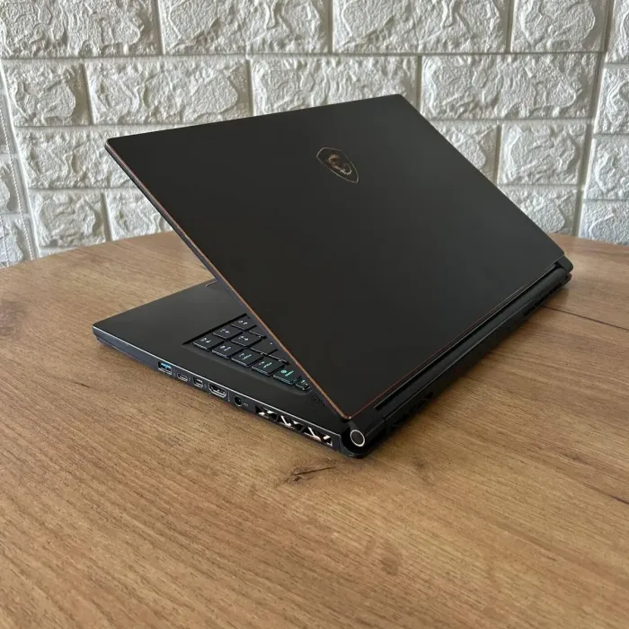 Ігровий ноутбук Б-клас MSI GS65 Stealth 8SF / 15.6" (1920x1080) IPS / Intel Core i7-8750H (6 (12) ядер по 2.2 - 4.1 GHz) / 32 GB DDR4 / 512 GB SSD / nVidia GeForce RTX 2060, 6 GB GDDR6, 192-bit / WebCam б/в - зображення 6