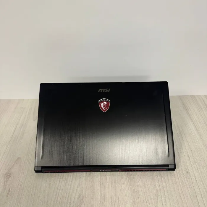Ігровий ноутбук Б-класу MSI GS63VR Stealth 6RF / 15.6" (1920x1080) IPS / Intel Core i7-6700HQ (4 (8) ядра по 2.6 - 3.5 GHz) / 16 GB DDR4 / 512 GB SSD / nVidia GeForce GTX 1060, 6 GB GDDR5, 192-bit / WebCam б/в - изображение 8