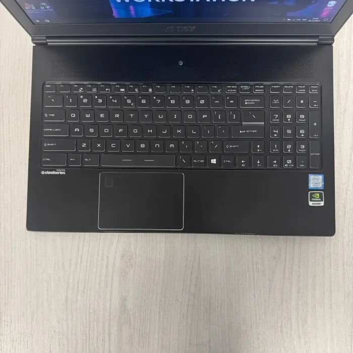 Мобільна робоча станція MSI WS63 7RK / 15,6" (1920x1080) IPS / Intel Core i7-7920HQ (4 (8) ядра по 3.1 - 4.1 GHz) / 16 GB DDR4 / 512 GB SSD / nVidia Quadro P3000, 6 GB GDDR5, 192-bit / WebCam б/в - зображення 3