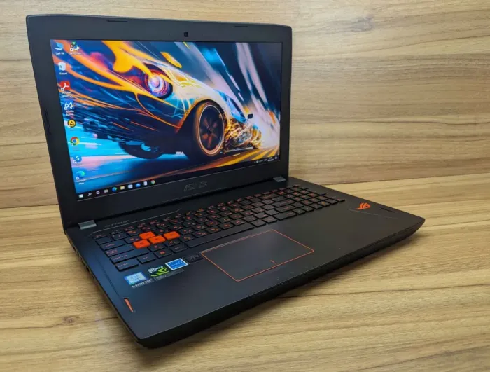 Ігровий ноутбук Asus Strix GL502V / 15.6" (1920x1080) IPS / Intel Core i7-7700HQ (4 (8) ядра по 2.8 - 3.8 GHz) / 16 GB DDR4 / 256 GB SSD + 1000 GB HDD / nVidia GeForce GTX 1070, 8 GB GDDR5, 256-bit / WebCam / Windows 10 б/в - зображення 4