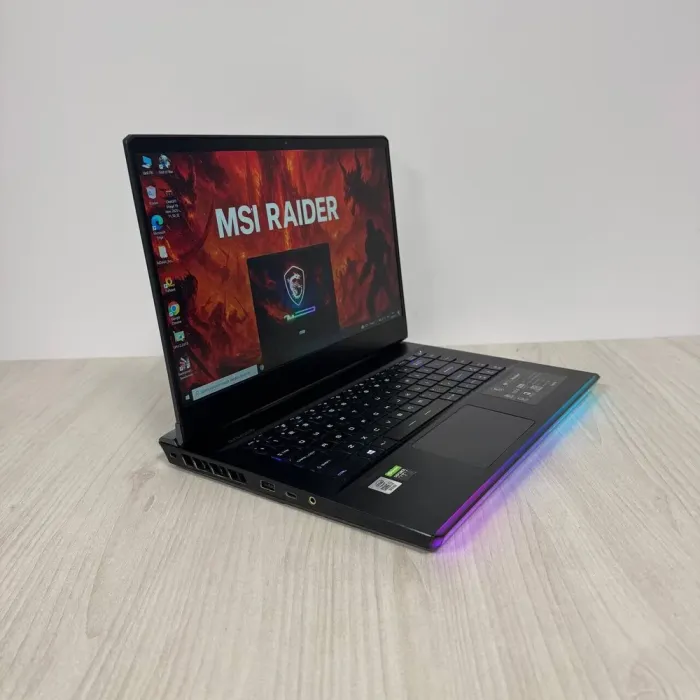 Ігровий ноутбук MSI GE66 Raider 10SFS / 15.6" (1920x1080) IPS / Intel Core i7-10750H (6 (12) ядер по 2,6 - 5,0 ГГц) / 32 ГБ DDR4 / 1000 ГБ SSD NVMe / nVidia GeForce RTX 2070 Super, 8 ГБ GDDR6, 256-bit / WebCam б/в - зображення 4