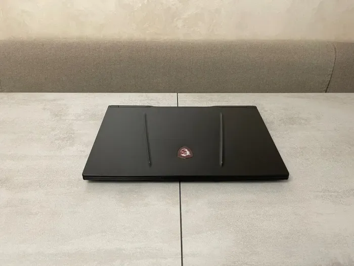 Ігровий ноутбук MSI GL75 Leopard 10SFK-029US / 17.3" (1920x1080) IPS / Intel Core i7-10750H (6 (12) ядер по 2,6 - 5,0 ГГц) / 16 ГБ DDR4 / 512 ГБ SSD M.2 + 500 ГБ HDD / nVidia GeForce RTX 2070, 8 ГБ GDDR6, 256-біт / WebCam б/в - зображення 7