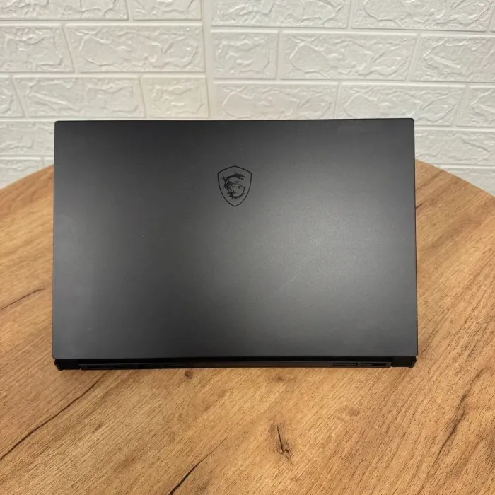 Ігровий ноутбук MSI GS66 Stealth 10SE / 15.6" (1920x1080) IPS / Intel Core i7-10875H (8 (16) ядра по 2.3 - 5.1 GHz) / 16 GB DDR4 / 512 GB SSD / nVidia GeForce RTX 2060, 6 GB GDDR6, 192-bit / WebCam б/в - зображення 3