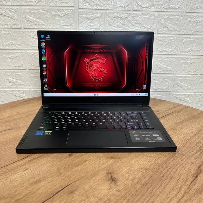 Ігровий ноутбук Б-клас MSI GS66 Stealth 11UG / 15.6" (1920x1080) IPS / Intel Core i7-11800H (8 (16) ядер по 2.3 - 4.6 GHz) / 16 GB DDR4 / 1000 GB SSD NVMe / nVidia GeForce RTX 3070, 8 GB GDDR6, 256-bit / WebCam б/в - зображення 2